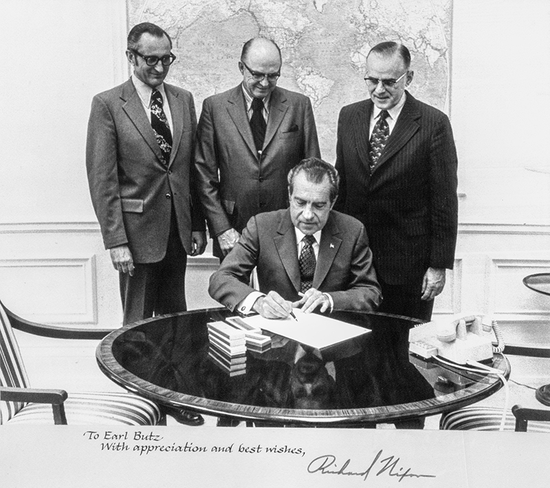 President Richard Nixon signing the Rural Development Act, August 30, 1972in the White House.