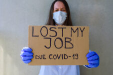 Image of Woman Holding Sign, Lost My Job Due to COVID-19