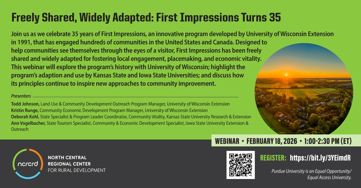 Aerial photo of a sunrise over a rural community of homes and farms.