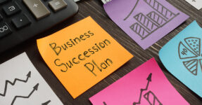 various colored post it notes with one saying "Business Succession Plan"